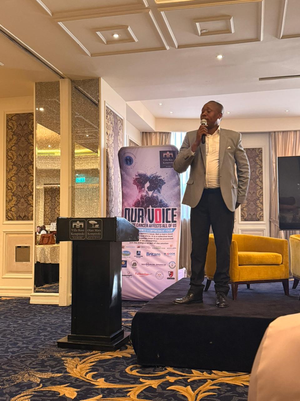 The National Cancer Institute of Kenya CEO, Dr. Elias Melly, at the “Our Voice” Cancer Awareness and Empowerment Forum, organized by Needy Cancer Health Initiative.